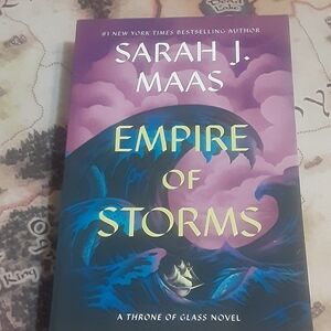 Empire of Storms by Sarah J. Maas Trade paperback Jim Tierney cover art. Book